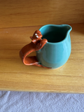 Pitchers (various sizes and glazes)