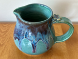 Pitchers (various sizes and glazes)