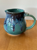 Pitchers (various sizes and glazes)